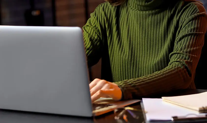 Woman editing at a comp uter.